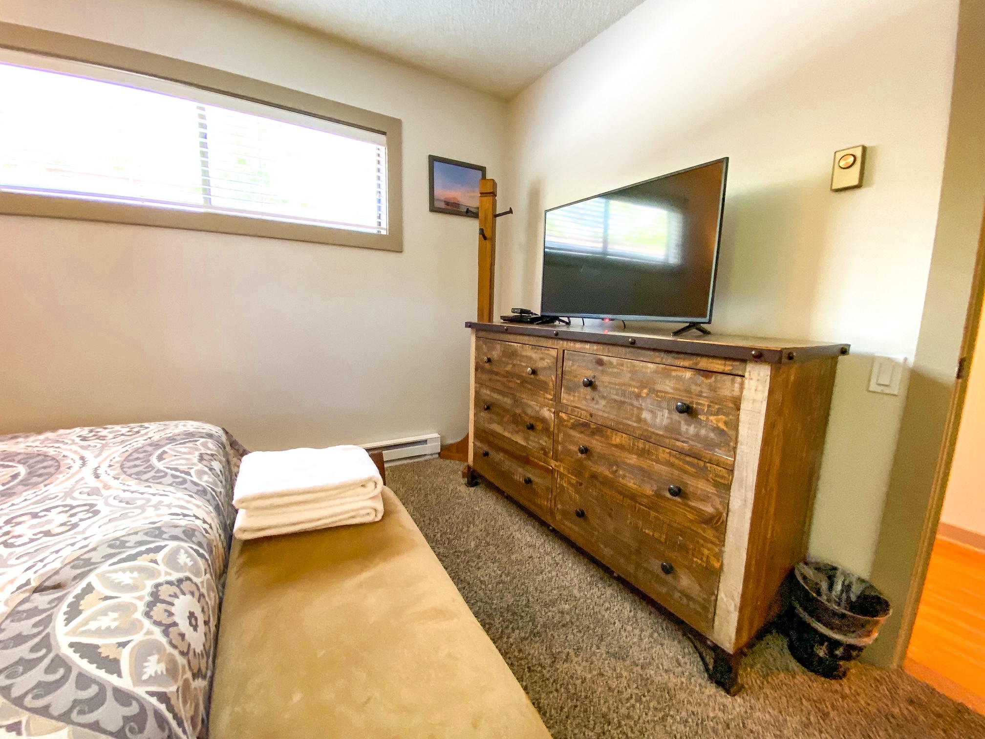 motorhome interior, kitchen, wood cabinets, microwave oven, 3-burner range,  window, mini blind, sink, tile backsplash; dinette seat, view into bedroom  Stock Photo - Alamy